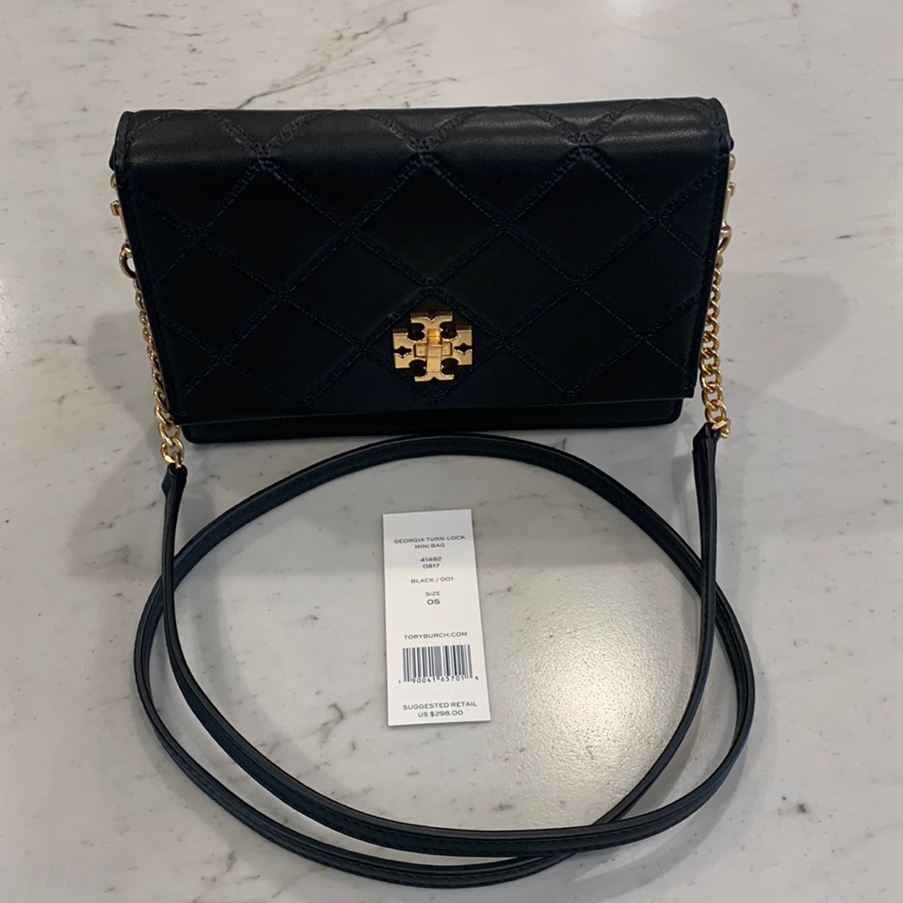 Tory Burch black convertible Georgia turn-lock mini bag with removable strap.